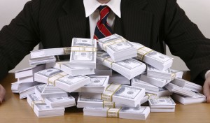 bonus pile of money hundred dollar bills benjamins cash