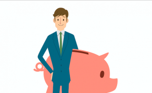 BUsinessman holding a Piggy bank Money rich
