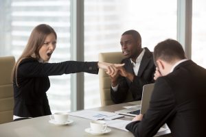 Angry female boss scolding employee, firing dismissing ineffective office worker angry yell scream diverse stress