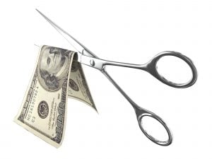 scissors cut money layoffs