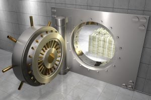 bank vault with stack of 100 dollar bills – Getty Images