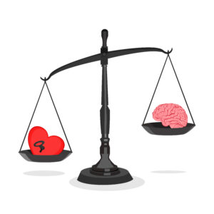 The brain and the heart on the imbalance scales. The concept uses feelings rather than reason