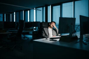 Young businessman tired at night