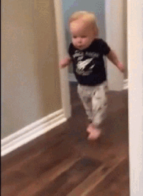 baby running away gif