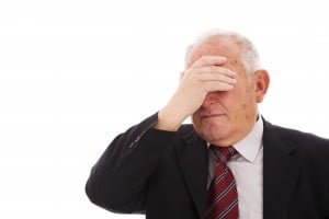 embarassed businessman lawyer faceplam face to palm old man