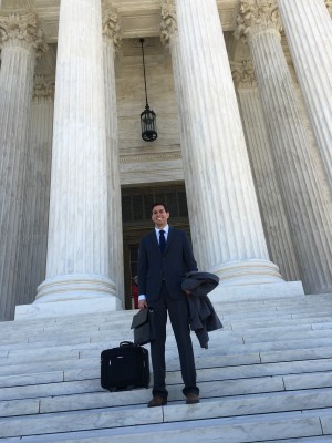Amir Ali, on the steps of the U.S. Supreme Court after his argument in Welch v. United States.