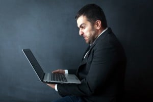 angry lawyer typing looking at computer