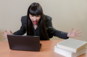 scream at computer legal technology tech angry upset associate woman lawyer