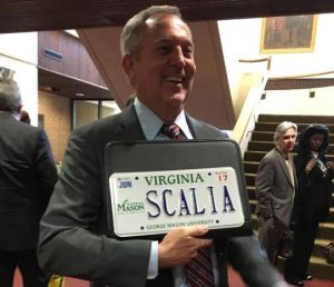 Dean Henry Butler proudly displaying his SCALIA vanity plate. (Photo via Facedbook)