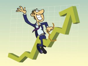 Businessman mounting on a line graph that goes up