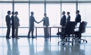 deal handshake merger acquisition mergers M and A shake hands.jpg