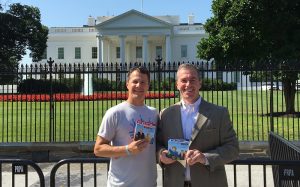 Rob Kulik (left) and Matt Dowd, in front of the White House with their books.
