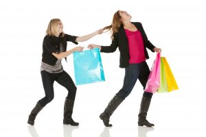 women fighting over shopping