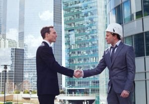 commercial real estate office building deal transaction closing handshake shaking hands