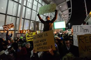 Protestors at JFK Airport (photo by Stephanie Keith/Getty Images).