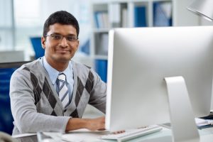 happy Indian computer programmer software developer technology tech