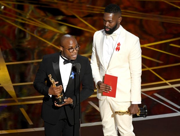 HOLLYWOOD, CA - FEBRUARY 26: Writer/director Barry Jenkins (L) and writer Tarell Alvin McCraney accept Best Adapted Screenplay for 'Moonlight' onstage during the 89th Annual Academy Awards at Hollywood & Highland Center on February 26, 2017 in Hollywood, California. (Photo by Kevin Winter/Getty Images)