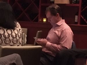 Justice Don Willett -- tweeting, I presume (photo by yours truly).