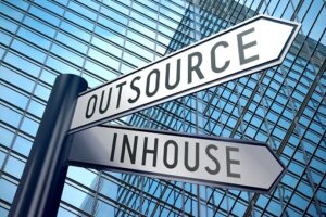 Signpost illustration, two arrows – inhouse, outsource