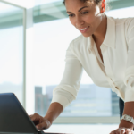 Businesswoman_working_on_laptop_in_office copy