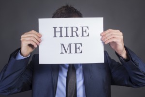 Man Holding "Hire Me!"