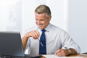 happy smiling lawyer with laptop computer