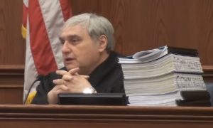 Judge Alex Kozinski (and a pile of fat briefs)