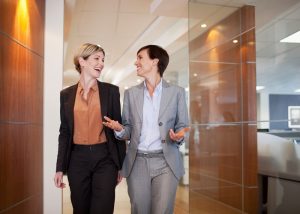 happy women lawyers female attorneys walking