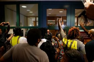 CHARLOTTE, NC - SEPTEMBER 21:  Protestors surround the Charlotte Police department as residents and activists protest the death of Keith Scott. (Photo by Brian Blanco/Getty Images)