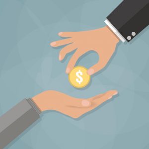 Hand giving golden coin to another hand