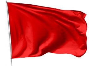 Red flag on flagpole