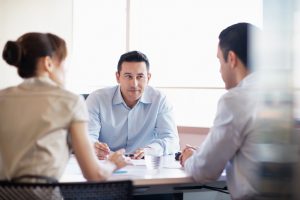 startup lawyer attorney business casual meeting conference table