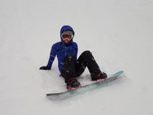 Allison Peryea gives snowboarding a shot.