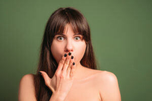 ashamed surprised scared emotion woman portrait
