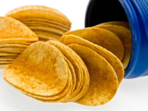 Barbecue flavored potato chips coming out of the can