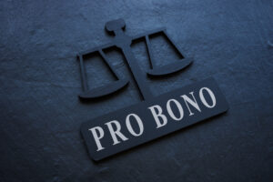 The inscription Pro bono on the plate in the form of scales.