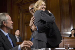 Lawyer and Defendant Celebrating Victory in Trial